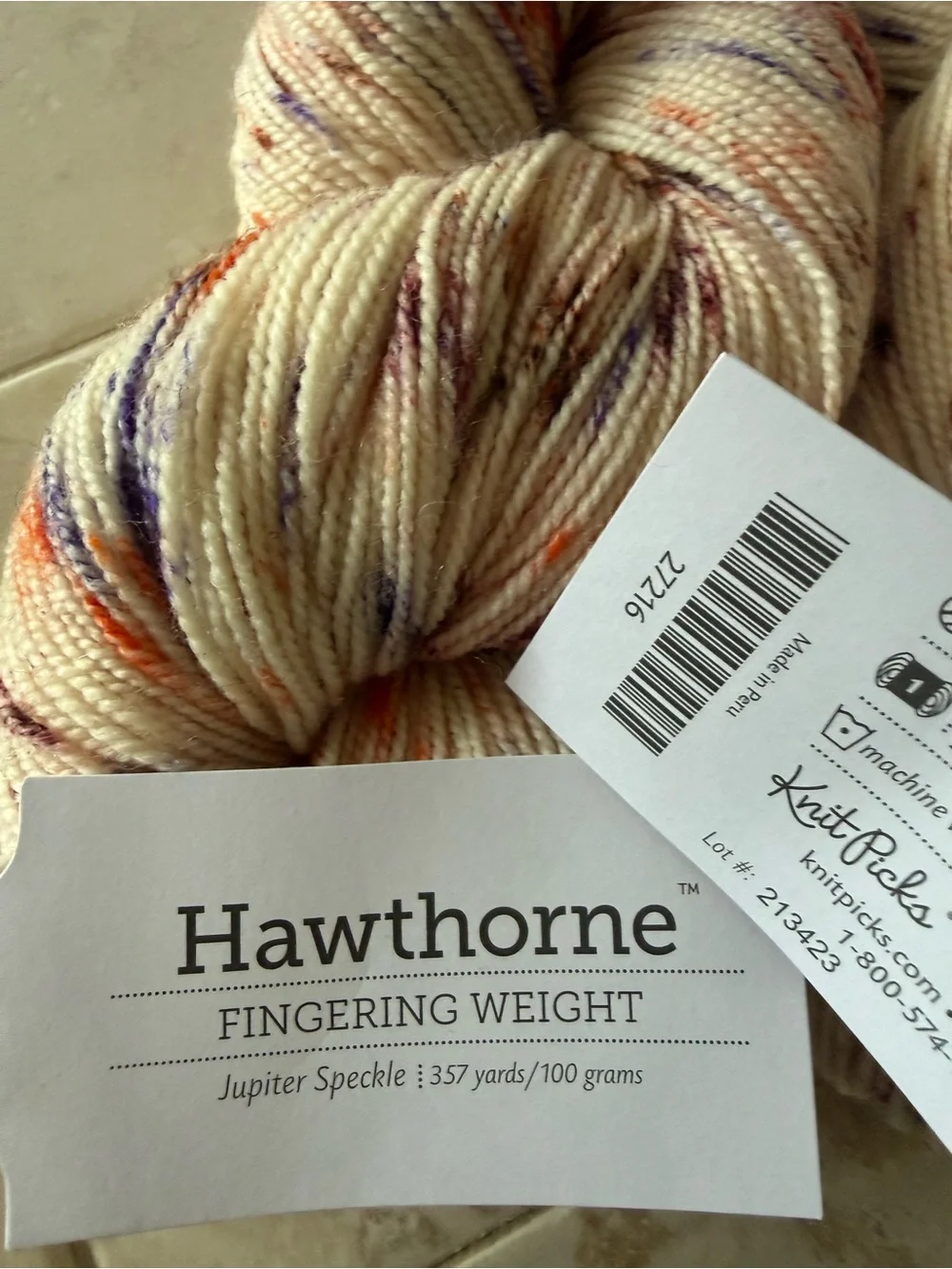 Hawthorne Fingering Weight Yarn - Jupiter Speckle (Cream with Orange & Purple)